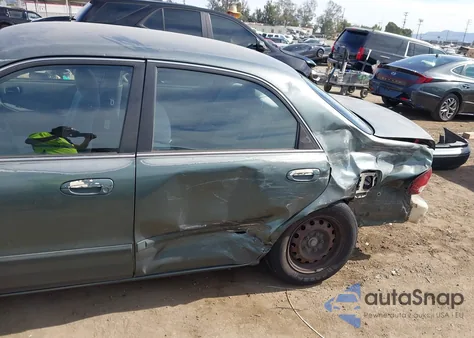 1998 Mazda 626 Dx/Lx from USA, damaged, VIN 1YVGF22C2W5691764